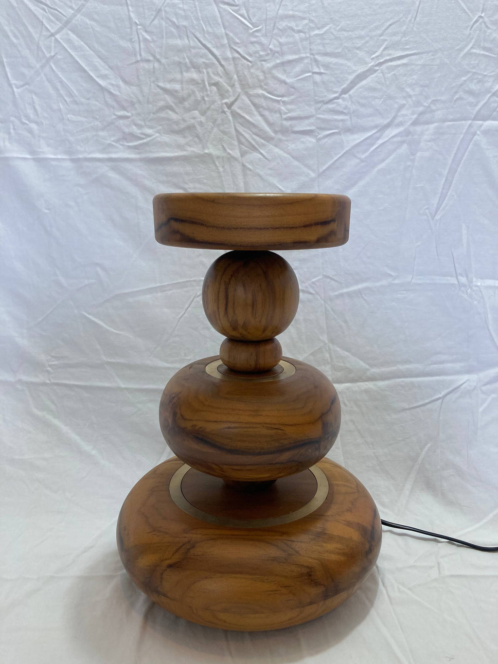 aikya table lamp by advit design lab - made of teak wood and brass rings